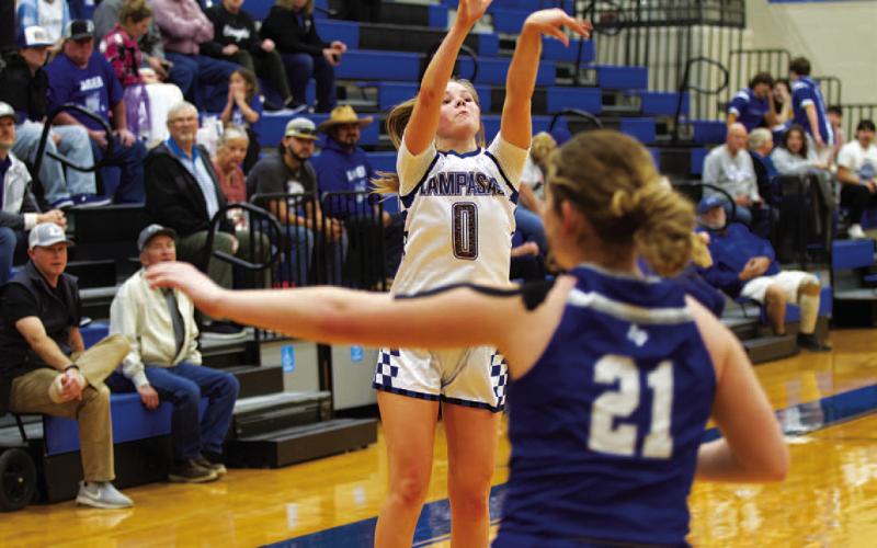 Addison Borchardt releases a three-point shot in the first half of the game against Jarrell. HUNTER KING | DISPATCH RECORD