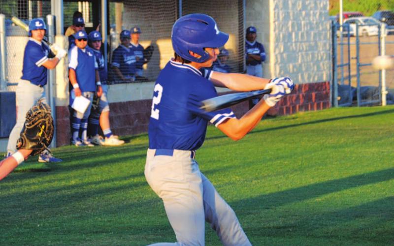 J.T. Poston swings at a pitch in his first at-bat against Llano in the Badgers’ final regular-season game before the playoff series. HUNTER KING | DISPATCH RECORD