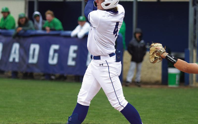 HUNTER KING | DISPATCH RECORD Rawlin Smith hits a pitch during the Burnet game.
