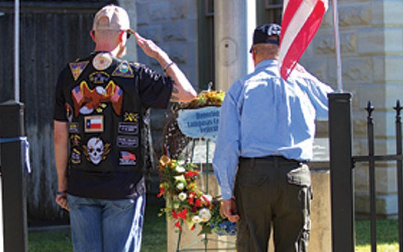 American Legion Post 277 members pay their respects in a wreath-laying ceremony at the Lampasas County Courthouse last year. File Photo