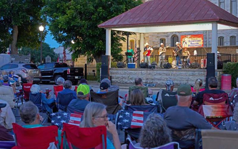 Adam Barrios | dispatch record The Lucas Brothers Band graced the Courtyard Square bandstand on Friday night to a full audience.