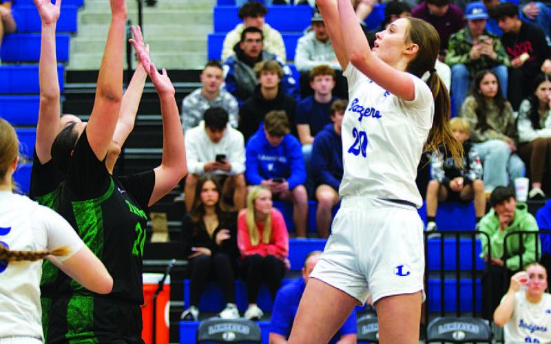 Lady Badgers dominate Taylor for second straight district win