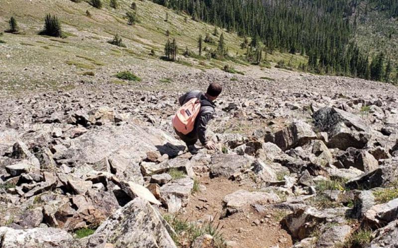 Chris Murrell uses joint stability and balance to make his way down a talus field on the side of Peak One. ALEXANDRIA RANDOLPH MURRELL | COURTESY PHOTO