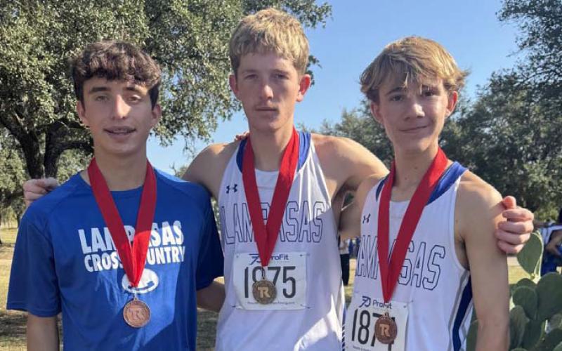 Royce Clary, left, John Keyes and Cohen Watson pose with their medals from the Salado meet. COURTESY PHOTO | KIM BURNSIDE
