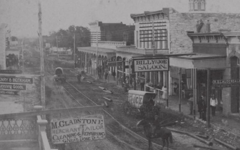 The unburied water pipes can be seen laying on the ground along the south side of Third Street between Live Oak Street and Western Avenue. The pipes were buried in the summer of 1885. COURTESY PHOTO | DEGOLYER LIBRARY, SOUTHERN METHODIST UNIVERSITY, LAWRENCE T. JONES III TEXAS PHOTOGRAPHY COLLECTION