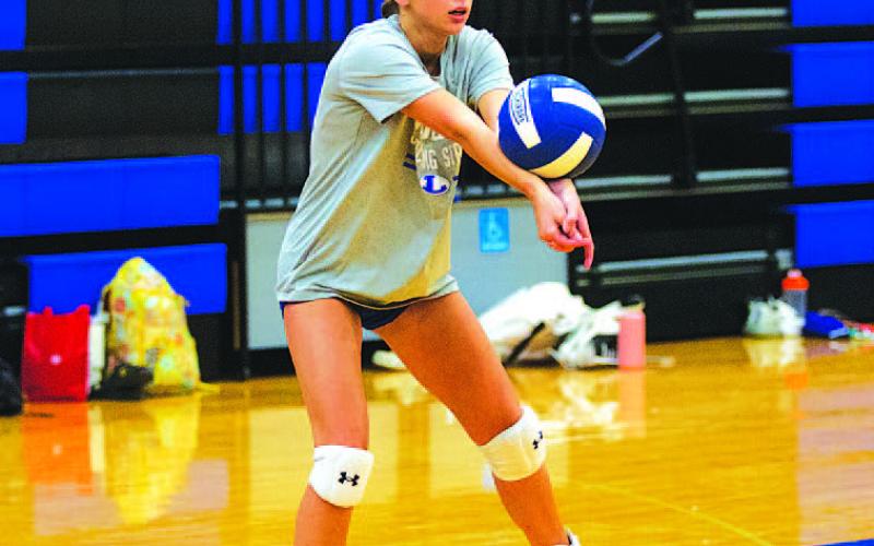 Landry White works on passing during volleyball practice. HUNTER KING | DISPATCH RECORD