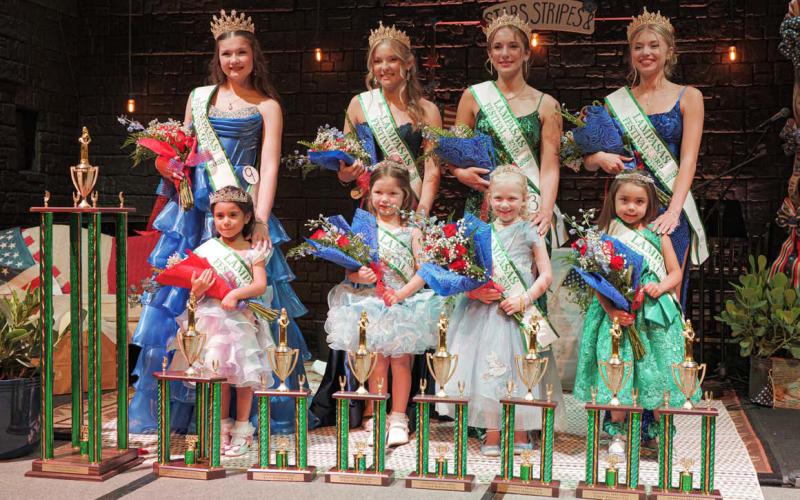 Members of the 2026 Spring Ho Court stand on stage after earning their crowns. The Little Miss Spring Ho Court, front row from left, includes Queen Auzi Rose Pena, first runner-up Marley Cottle, second runner-up Emma Cate Phillips and third runner-up Ellie Marquez. Behing the Little Miss Court is the 2026 Miss Spring Ho Court, from left, Queen Hallie Watson, first runner-up Tayler Sheard, second runner-up Gia Grasso and third runner-up Emerie Greenberg. ADAM BARRIOS | DISPATCH RECORD