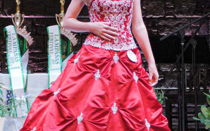Vivien Martin makes her way across the stage at Monday’s pageant at Grace Fellowship Church. ADAM BARRIOS | DISPATCH RECORD