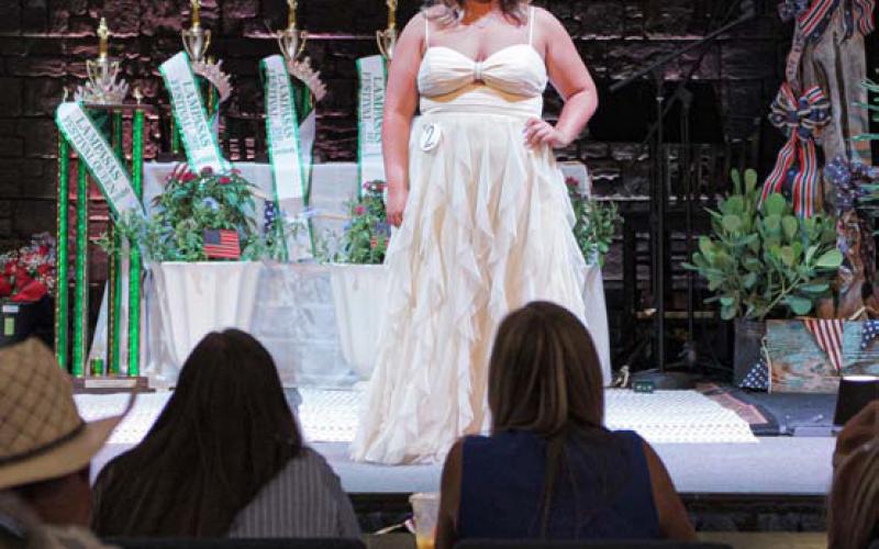 Kinzy Roscoe strikes a pose for the judges. ADAM BARRIOS | DISPATCH RECORD