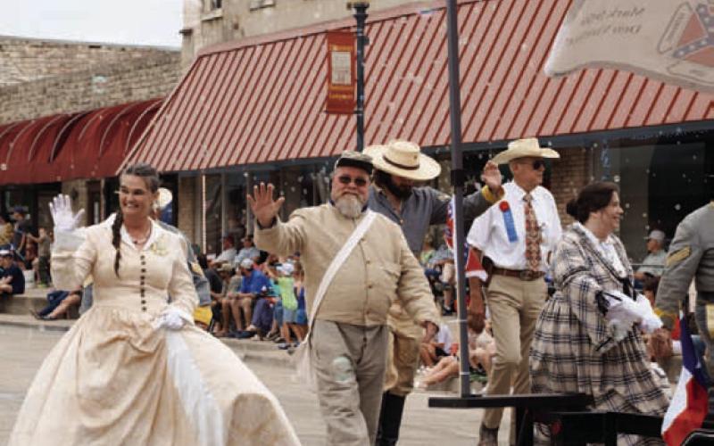 Period pomp was on promenade during the Spring Ho Parade. ADAM BARRIOS | DISPATCH RECORD