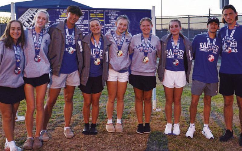 COURTESY PHOTO | KENNETH PEISER The tennis team poses with their medals from the Copperas Cove tournament last week.
