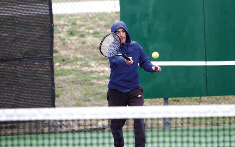 HUNTER KING | DISPATCH RECORD Brock Messinger finished second in mixed doubles with his partner Loretta Hodges.