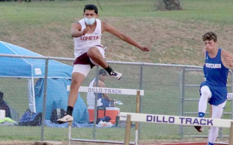 Luis Acevedo competes in the 300m hurdles at the District 17-A track meet on Tuesday, where he placed second in the event. EMILY ANDRADE | LOMETA ISD