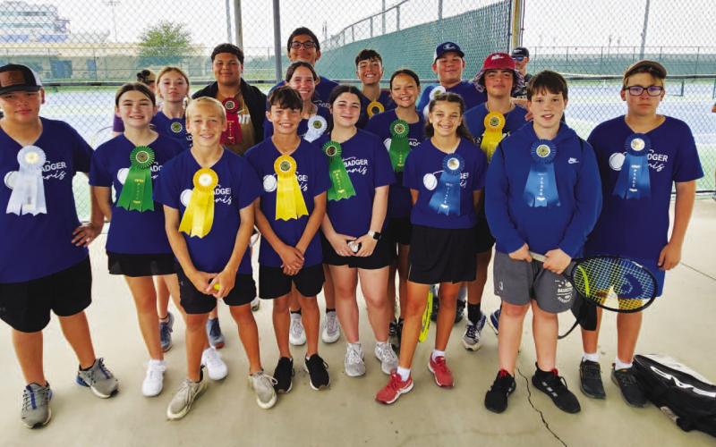 Middle school tennis players pose with their ribbons from last week’s district tournament. COURTESY PHOTO | LAINA WHITE