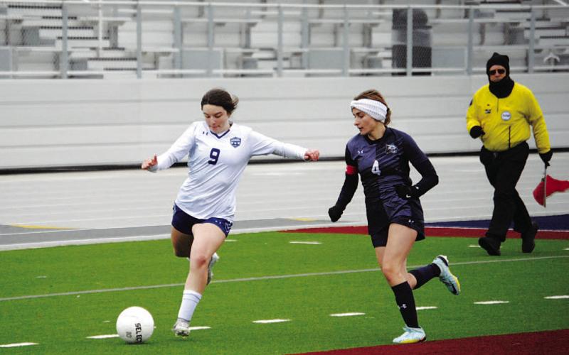 Bella Lindsey prepares to make a pass. The junior will be a leader for the Lady Badgers this season. HUNTER KING | DISPATCH RECORD