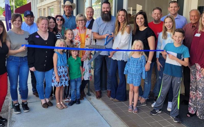 Downtown real estate office celebrates with a ribbon-cutting event