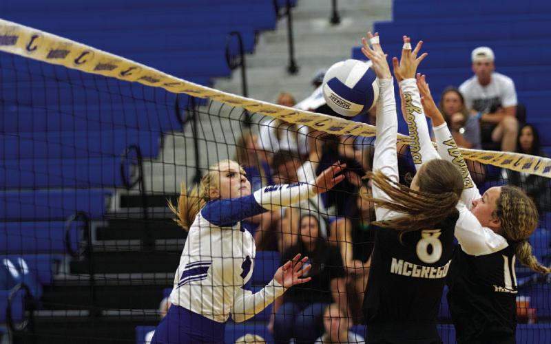 HUNTER KING | DISPATCH RECORD Brylie Turner swings through one of her 13 kills against McGregor on Monday.
