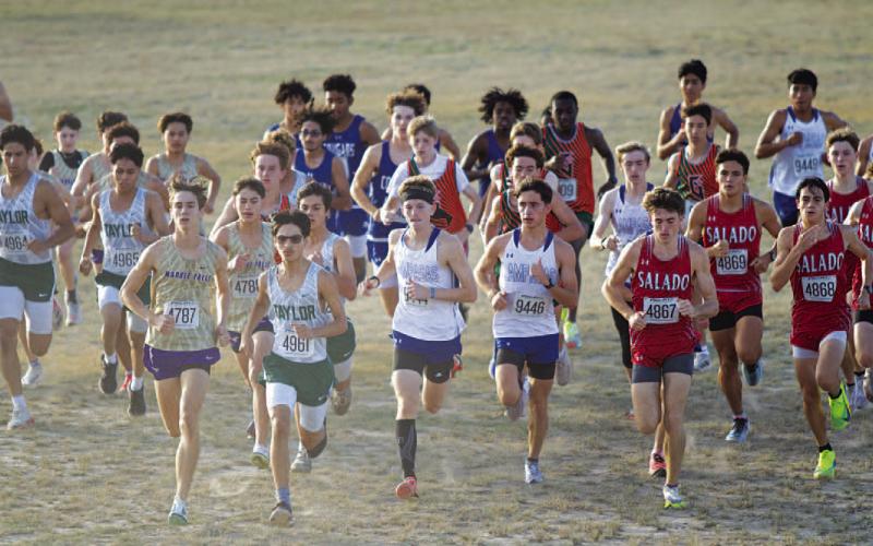 ’ cross country team take off at the district meet on the trails at the 580 Sports Park in Lampasas.