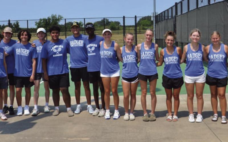 The tennis team poses for a photo after one of their matches last week. COURTESY PHOTO | KENNETH PEISER