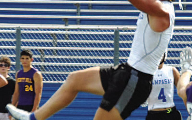 Reed Jerome goes up over the middle during 7-on-7 last year. HUNTER KING | DISPATCH RECORD