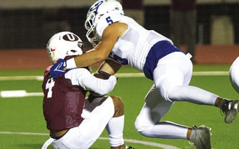 Raider Morua makes a tackle for loss on the Uvalde running back. HUNTER KING | DISPATCH RECORD