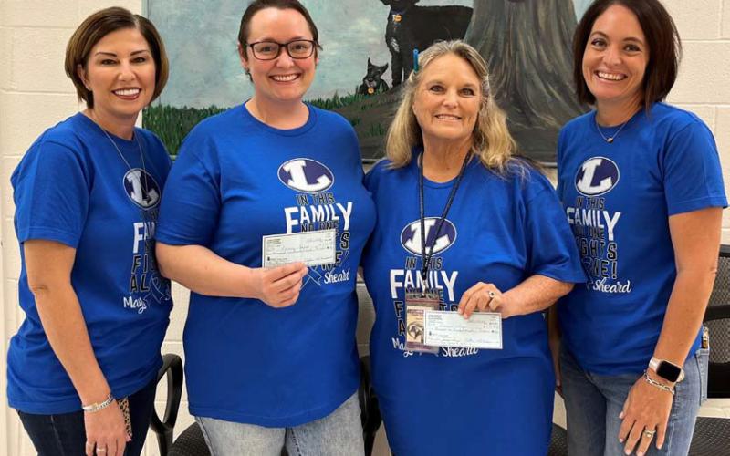 Students donate to help teachers fight cancer
