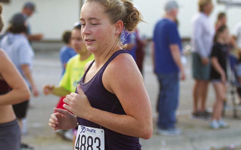 Abigail Valdez takes off from the starting line. HUNTER KING | DISPATCH RECORD