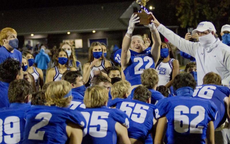 Badgers defend district football title