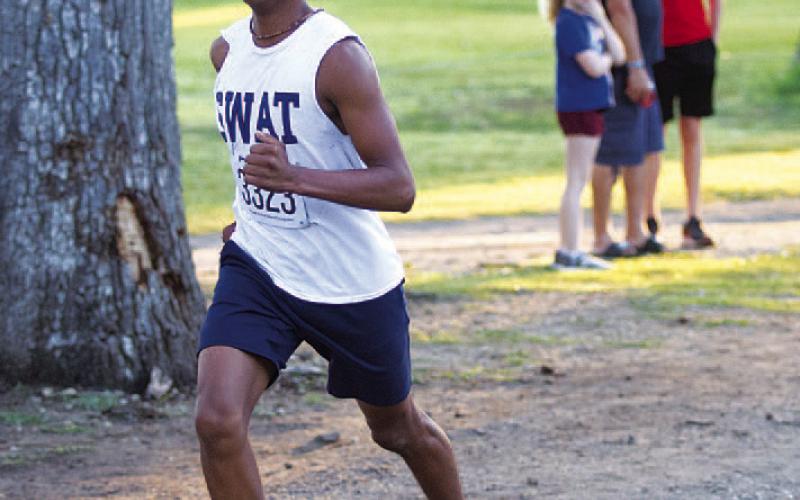 HUNTER KING | DISPATCH RECORD Zimri Vergara was the first-place finisher in the 1-mile race on Saturday.