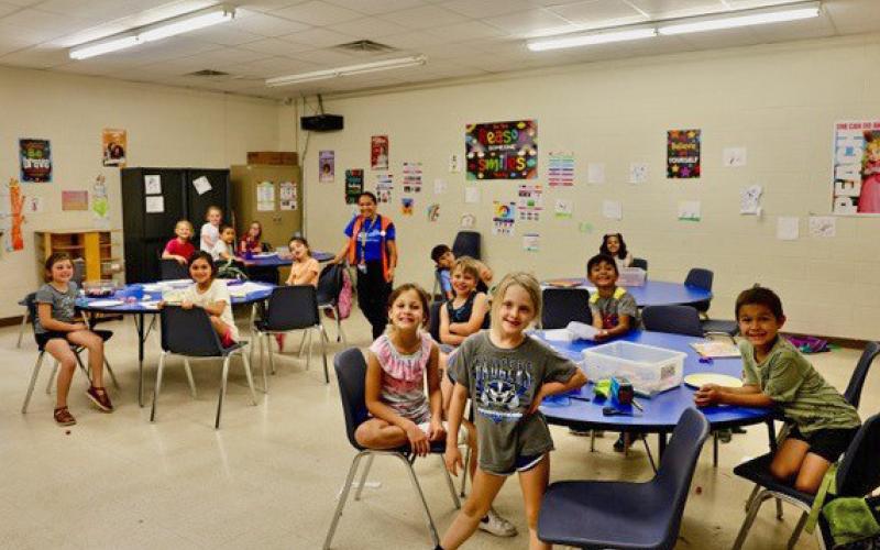 These first-grade children beam with infectious smiles while sitting together in their art class, taught by Ms. Marisela Gamez. She is a longtime teacher at the Boys and Girls Club in Lampasas. joycesarah mccabe | dispatch record