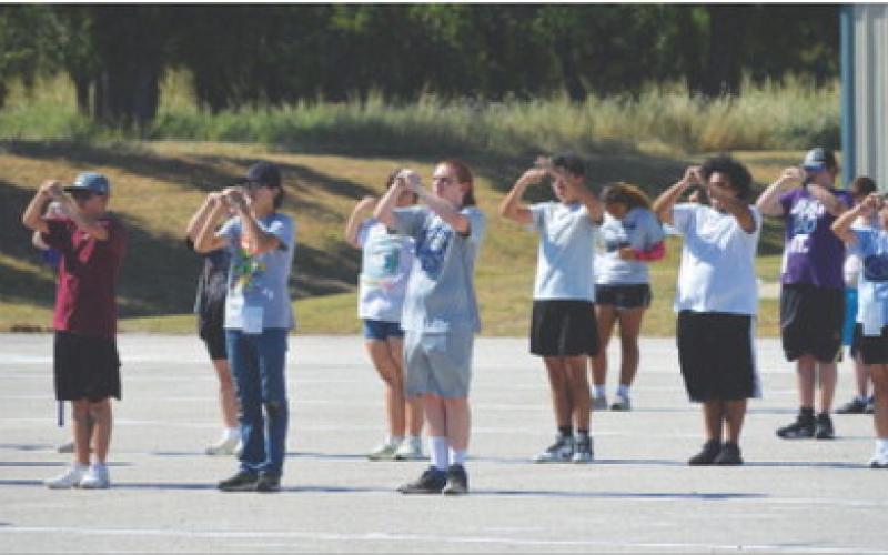 LHS Badger Band members practice marching steps for the group’s “Fallout” performance during Monday’s afterschool practice. ERICK MITCHELL | DISPATCH RECORD