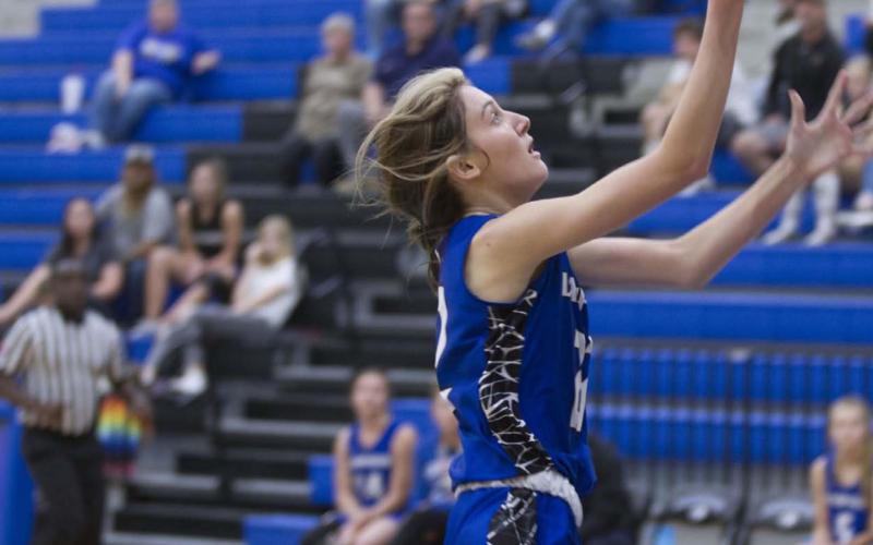 Junior Payton Tatum goes up for a layup during the Lady Badgers’ scrimmage against Lake Belton on Tuesday. HUNTER KING | DISPATCH RECORD
