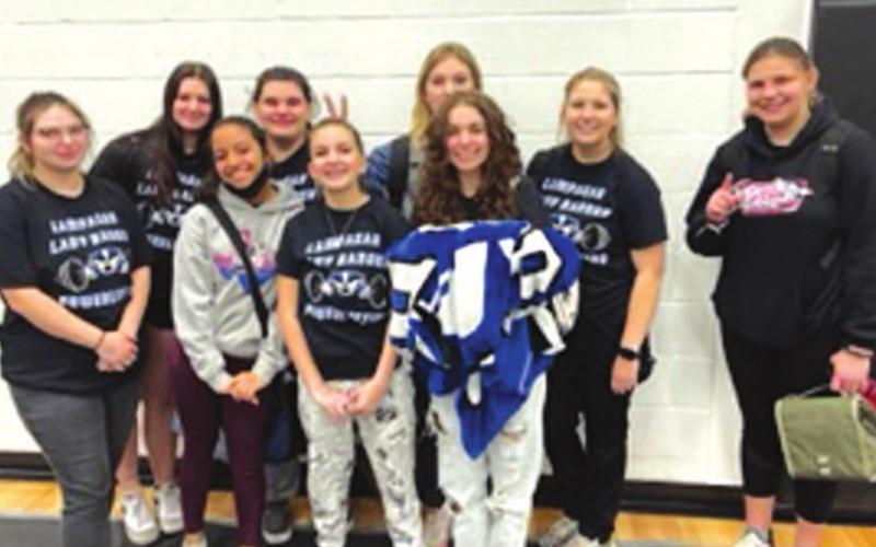 The Lampasas girls’ powerlifting team poses for a photo after a meet earlier this year. COURTESY PHOTO