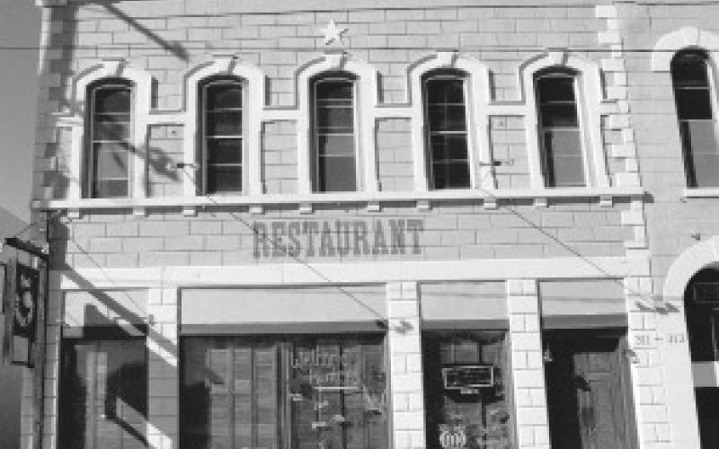The Commercial Saloon was located in this building on East Third Street. File photo