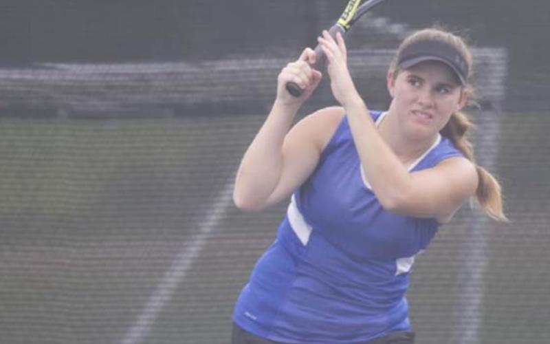 Klair Clements follows through on a backhand shot during her doubles match against Copperas Cove. HUNTER KING | DISPATCH RECORD
