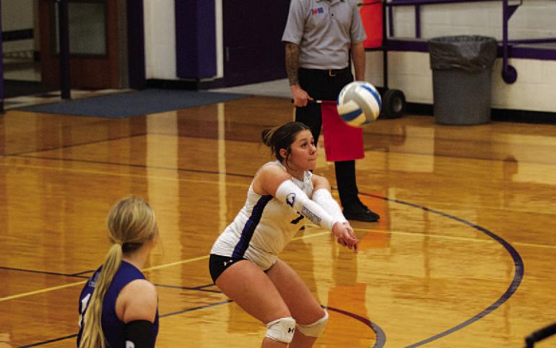 HUNTER KING | DISPATCH RECORD Jacie Resa plays a pass to a teammate in the first set of Tuesday’s match. Resa has led the team in digs in most matches this season.