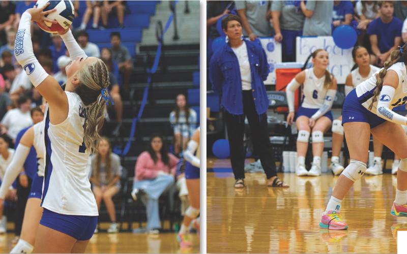 HUNTER KING | DISPATCH RECORD HUNTER KING | DISPATCH RECORD Brailey Wilson sets the ball during the Lady Badgers’ match on Tuesday. Abbey Green was a standout player against Manor New Tech.