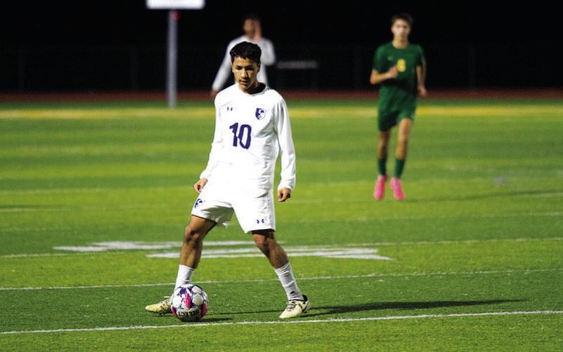 Xavier Contreras looks at his options in the first half of Tuesday’s match. HUNTER KING | DISPATCH RECORD