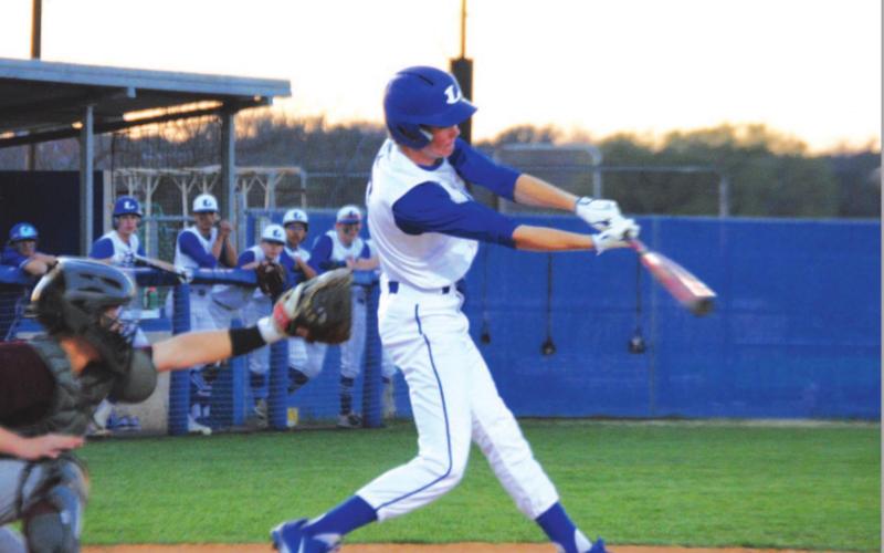 Nate Borchardt swings at a pitch during the Badgers’ win over Brownwood last week. HUNTER KING | DISPATCH RECORD