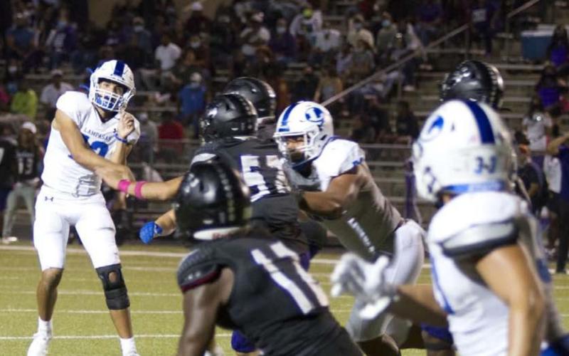Dylan Sanchez tosses a pass to Josh Carter in the end zone for a touchdown against LBJ. HUNTER KING | DISPATCH RECORD