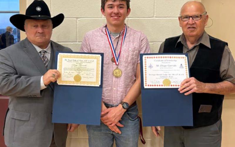 Members of Saratoga Masonic Lodge #546 were in Lometa this week to present annual awards to its honorees in the school district. Saratoga Lodge representatives Paul Plourde, at left, and Bob Caughron, right, are pictured with Lamar Medal student recipient Diego Garrido, who also earned a $1,000 scholarship with this award. courtesy photo