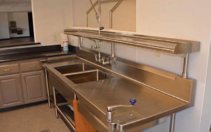 HUNTER KING | DISPATCH RECORD This new sink is part of the kitchen that will allow residents to cook for guests at future events.