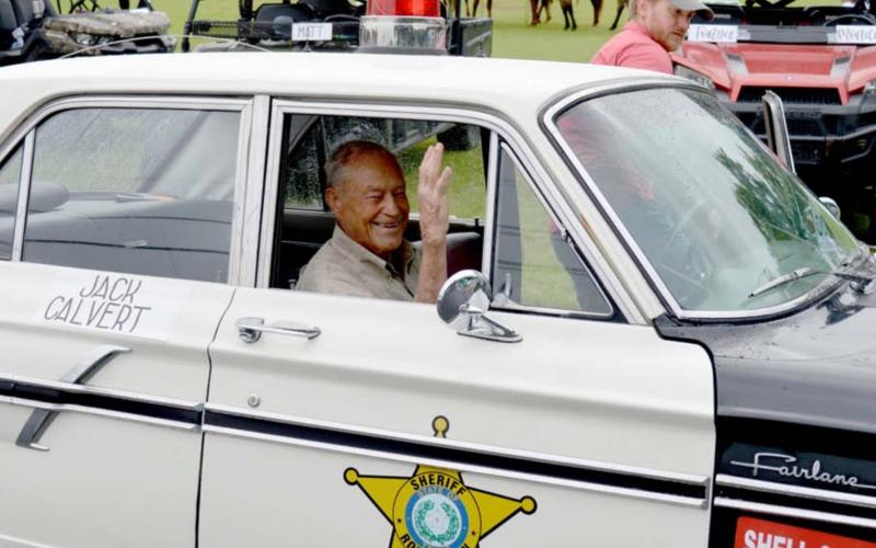 Parade marshal prepares to greet the crowds
