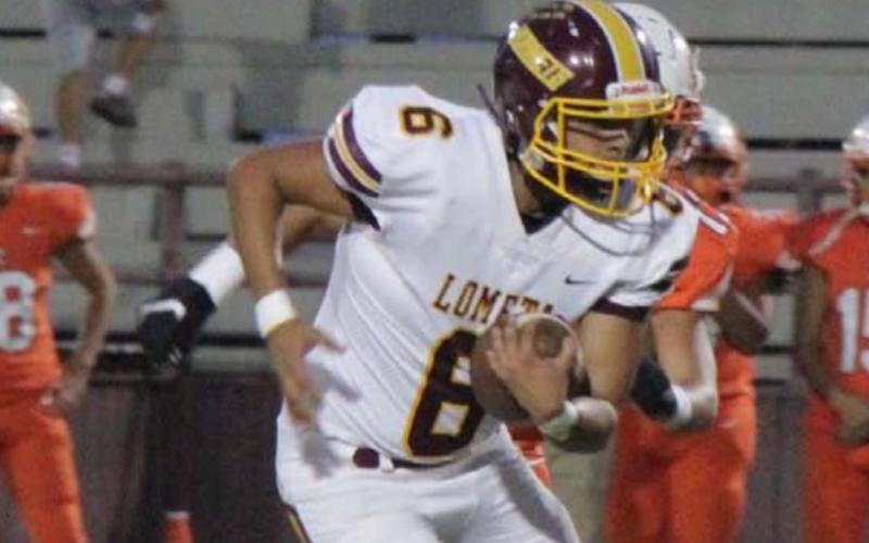 Luis Hernandez runs through the Rotan defense on his way to 58 yards rushing and a touchdown last Friday. JESSICA MALDONADO | DISPATCH RECORD