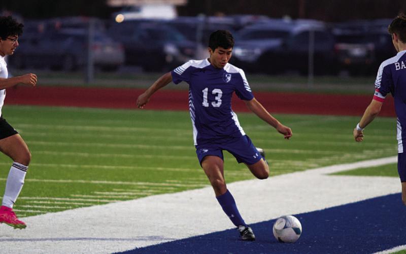 HUNTER KING | DISPATCH RECORD Juan Rodriguez prepares to clear a ball down the field.