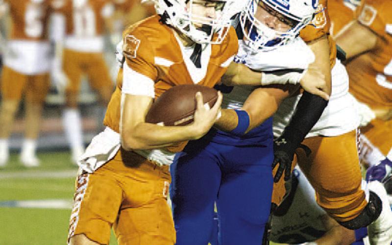 Raider Morua makes a tackle for loss against Alice last week. HUNTER KING | DISPATCH RECORD