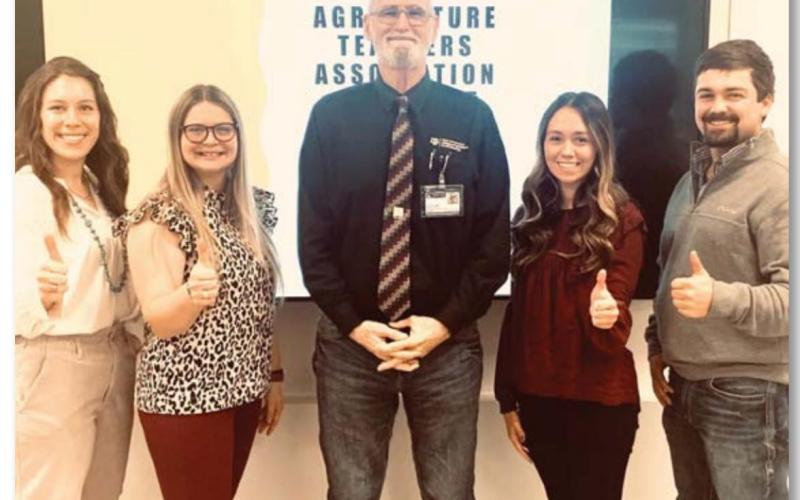 Student-teachers meet with mentor
