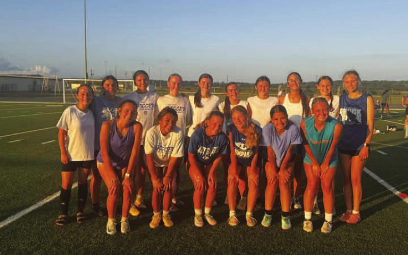 COURTESY PHOTO | LAMPASAS ATHLETICS FACEBOOK The girls’ soccer team poses for a photo after summer league matches.
