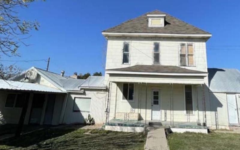 The Lometa Independent School District Board of Trustees approved a bid from a Liberty Hill contractor to remove asbestos and demolish an old house on the north end of the Lometa ISD property. MASON HINES | DISPATCH RECORD