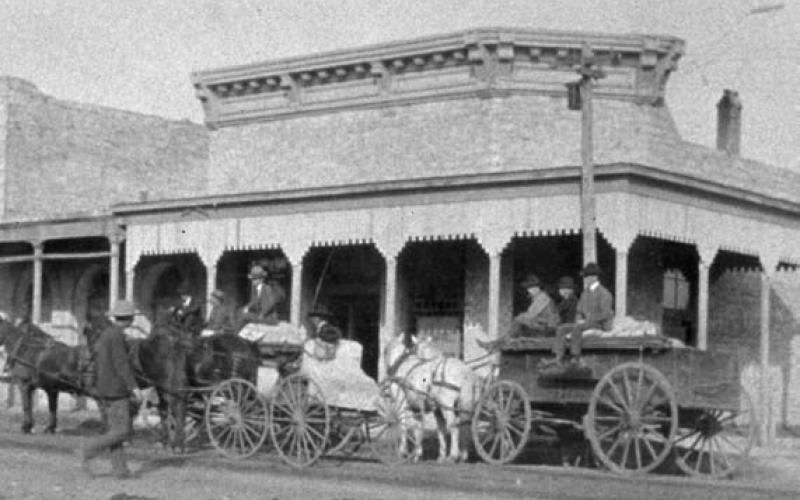 The Cooley Baltrun Law Office, pictured above, will be decorated and ready to receive visitors Dec. 3 to tour the historic building on East Third Street. The building was constructed around the 1890s and, as the original photo shows below, it has been a part of Lampasas’ history ever since. Tour of Homes tickets are available at the Lampasas County Museum for $15, which allows entrance to all five properties featured on this year’s tour.